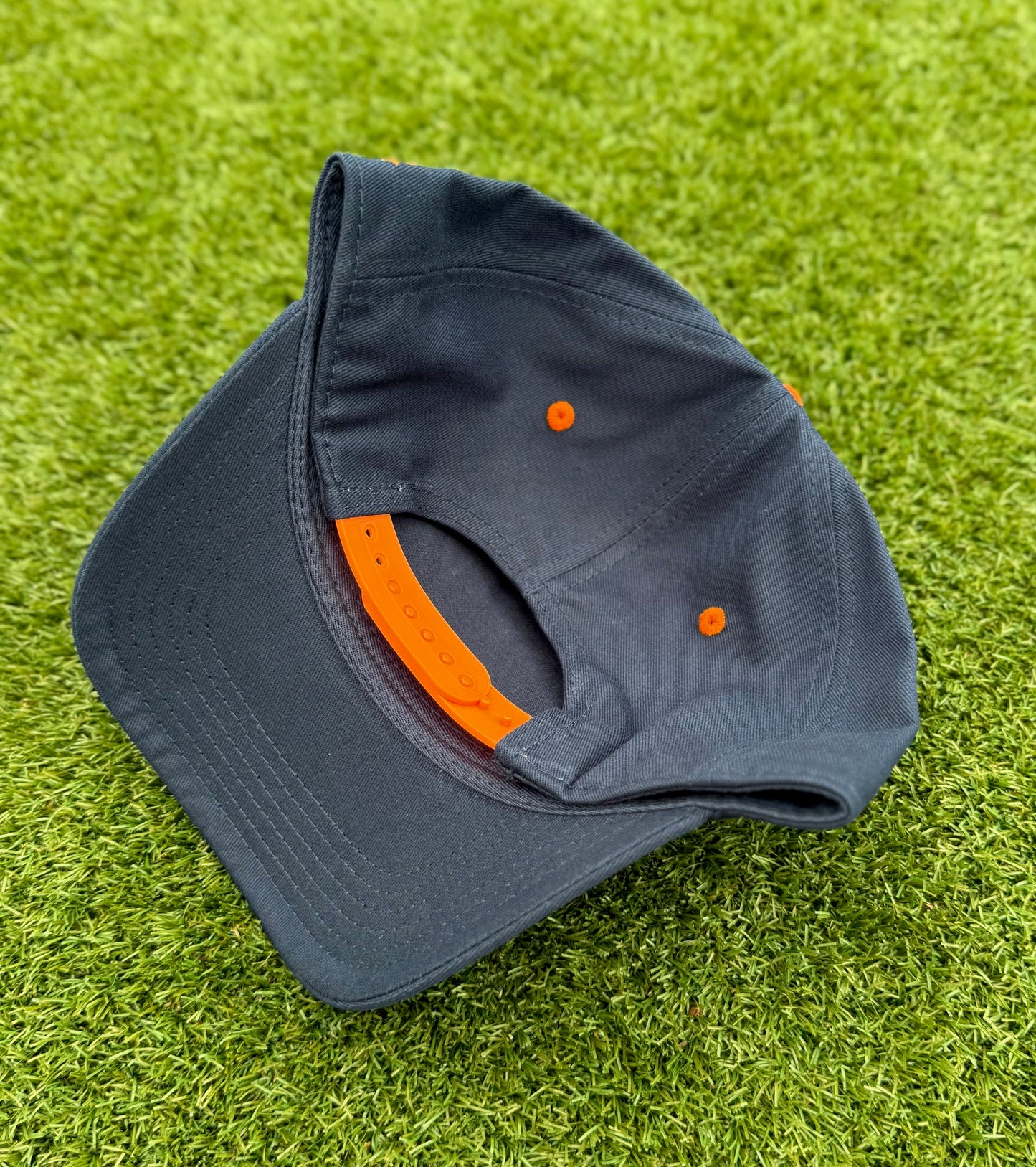 Navy with Orange Stitching and Orange Underbrim | Pre-curved Snapback