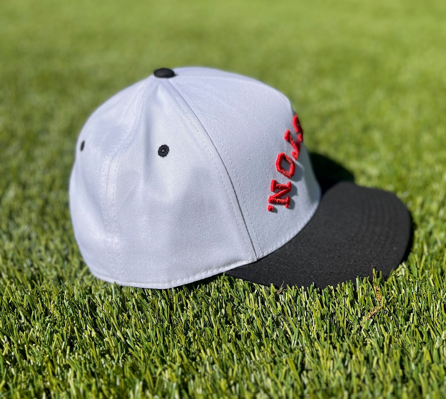 White with Red Stitching, Black Bill |  Red Panda | Pre-curved Snapback